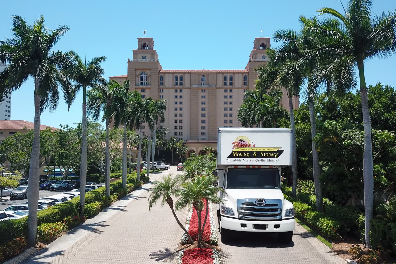 A Florida's Decorators Warehousing & Delivery truck during a coordinated delivery at an upscale Gulf Coast property.